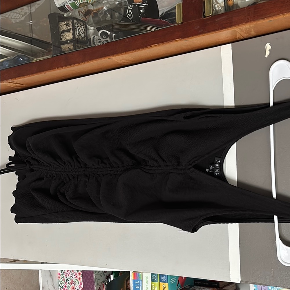 Large T•I•M•I•N•G Dress 
Adjustable string 
Only worn once